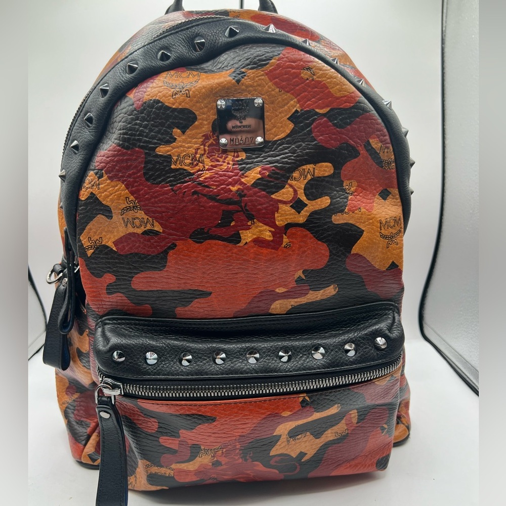 MCM 🔥full-size backpack visetos Camo orange with blk studs